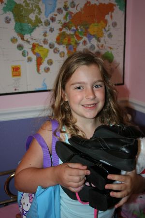 Ainsley giving away her shoes